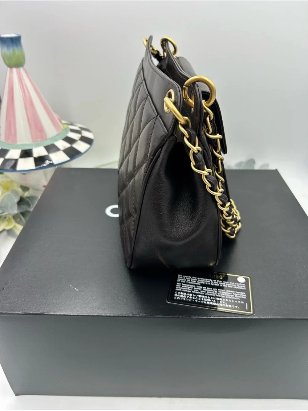 CHANEL Quilted Leather Shoulder Bag in Black with Gold Hardware